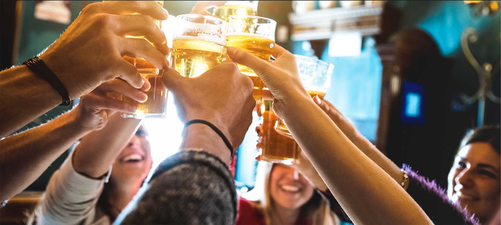 Close up photo of people toasting